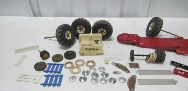 VINTAGE TONKA TRUCK PARTS: Wheels, Hubcaps, Trailor Part, Misc - Image 1 of 4