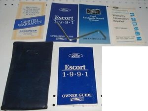 Ford Escort 1991 guía de operación conjunto manual guía del dueño con funda OEM - Imagen 1 de 1