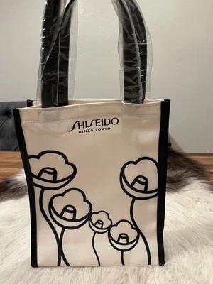 BOLSO DE MANO SHISEIDO GINZA TOKYO PEQUEÑO DE LONA CON ASA Nuevo Foto 1 de 4
