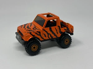 Jeep Suzuki Safari Mattel Hot Wheels Orange 1988 vintage 4x4 con rayas de tigre - Imagen 1 de 8