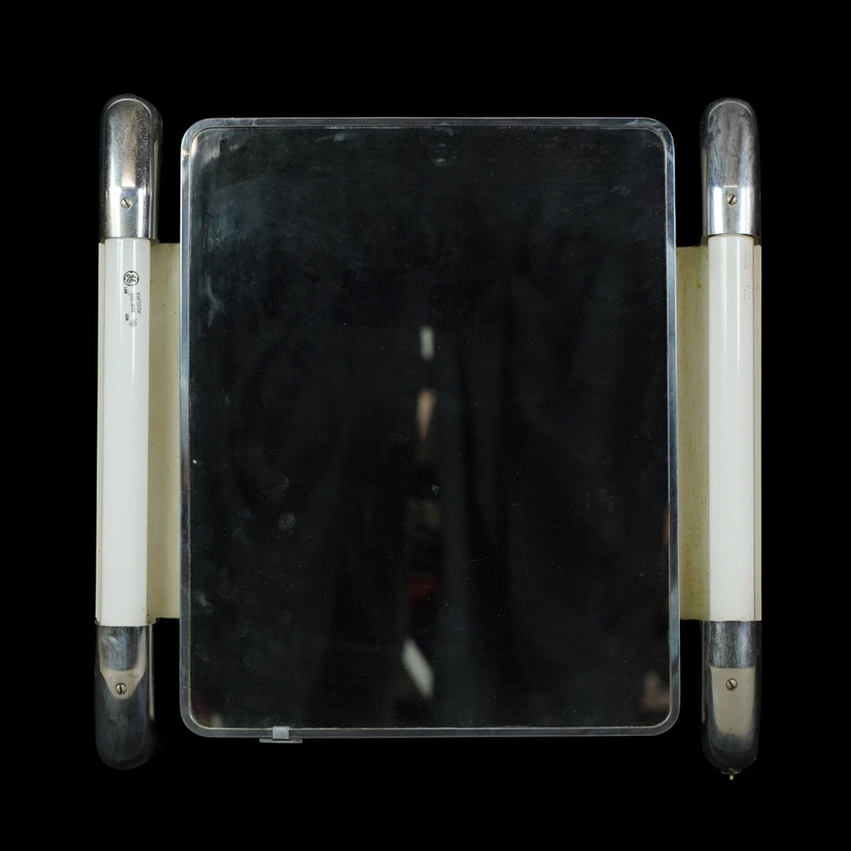 Botiquín Art Deco con espejo de acero ligero fluorescente Foto 1 de 4