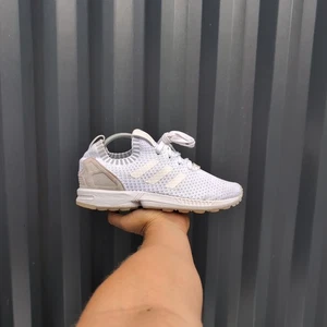 UK 7 - Scarpe stringate Adidas ZX Flux PK da uomo running trainer bianche runner S75977 - Foto 1 di 12