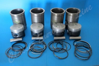A set of 4 Peugeot 504 XM KF5 KF6 1796cc 84mm pistons with liners / chemise. NOS - Image 1 of 4