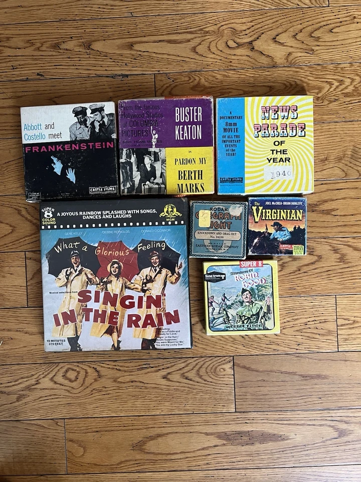 Lot of 7 Super 8 Films - Singin in the Rain, Robin Hood, Buster Keaton and More - Image 1 of 1