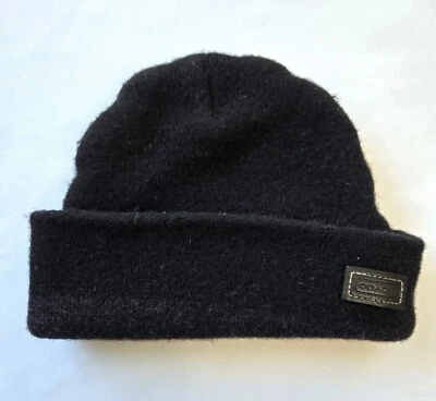 Gorro negro Coach para bebé niño pequeño 100 % lana merino con etiqueta de marca de cuero negro Foto 1 de 4