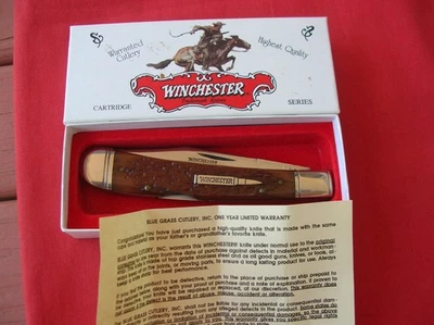 CUCHILLO WINCHESTER 19107 LOCKBACK NARANJA PLANTILLA MANGOS HUESO 1994 Foto 1 de 4