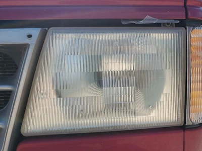 Faro conductor Ford E150 E250 E350 Econoline LH 1992-1996 FABRICANTE DE EQUIPOS ORIGINALES Foto 1 de 4