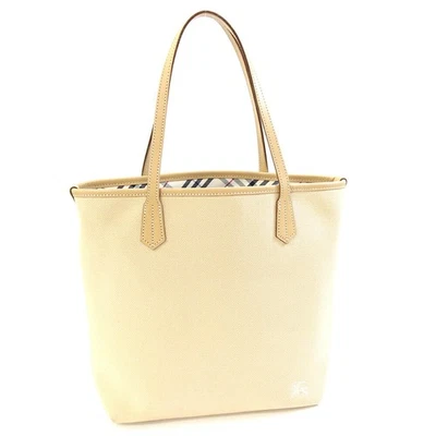 Bolso tote Burberry Blue Label de segunda mano en lona y cuero amarillo beige. Foto 1 de 4
