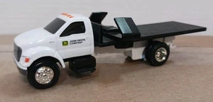 ERTL FORD F750 Flatbed Truck JOHN DEERE Company 1:64 Scale Diecast Model - Picture 1 of 7