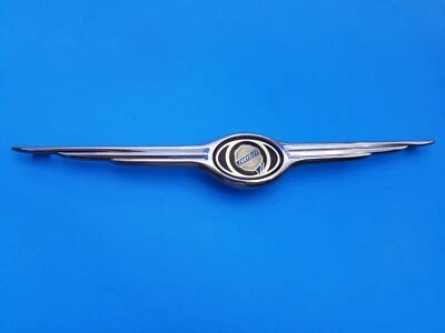 01 02 03 04 CHRYSLER TOWN & COUNTRY PARRILLA DELANTERA EMBLEMA INSIGNIA SÍMBOLO USADO OEM A4 Foto 1 de 4