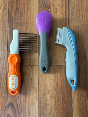 Desenredante de pelo de perro Wahl, buscador de cobertizos y cepillos Hartz Fetcher Foto 1 de 2