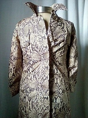Gabardina pequeña de colección años 60 con estampado de leopardo hecha en EE. UU. talla S Foto 1 de 4