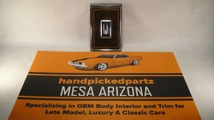 1984 OLDSMOBILE TORONADO REAR CENTER SEAT WOODGRAIN EMBLEM PLATE #20089923 - Picture 1 of 8