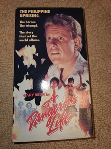 A Dangerous Life - The Phillippine Uprising - Gary Busey VHS - ITC Home Video - Picture 1 of 4