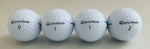 NEW Lot of 4 White TaylorMade Distance+ Golf Balls Alignment Aid Free Shipping - Picture 1 of 6