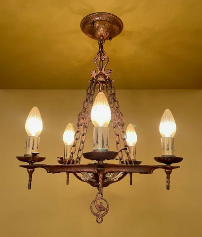 Vintage Lighting 1930 Spanish Revival Dog Head coppery chandelier by Virden Cover