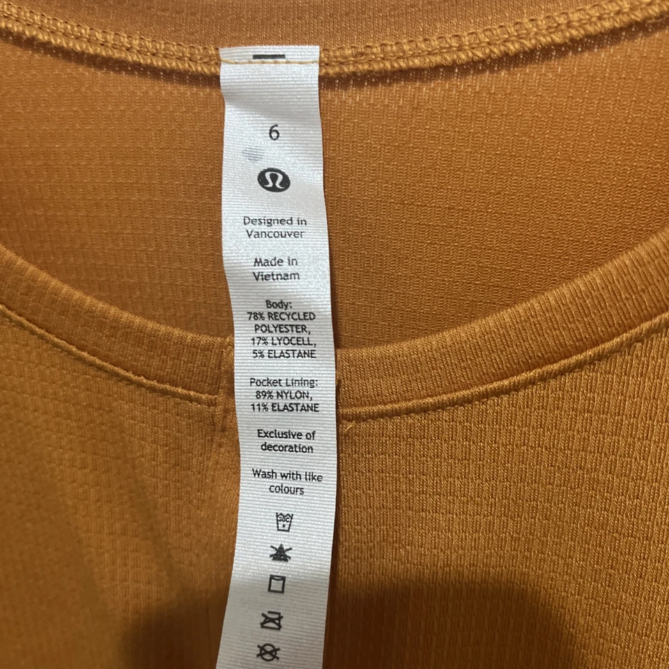 Top LULULEMON Swiftly Tech Manga Larga Crew Naranja Talla 6 Foto 1 de 4