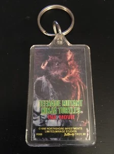 PORTACHIAVI VINTAGE 1990 MIRAGE TMNT TEENAGE MUTANT NINJA TURTLES FILM SCHEGGIA 2" - Foto 1 di 1