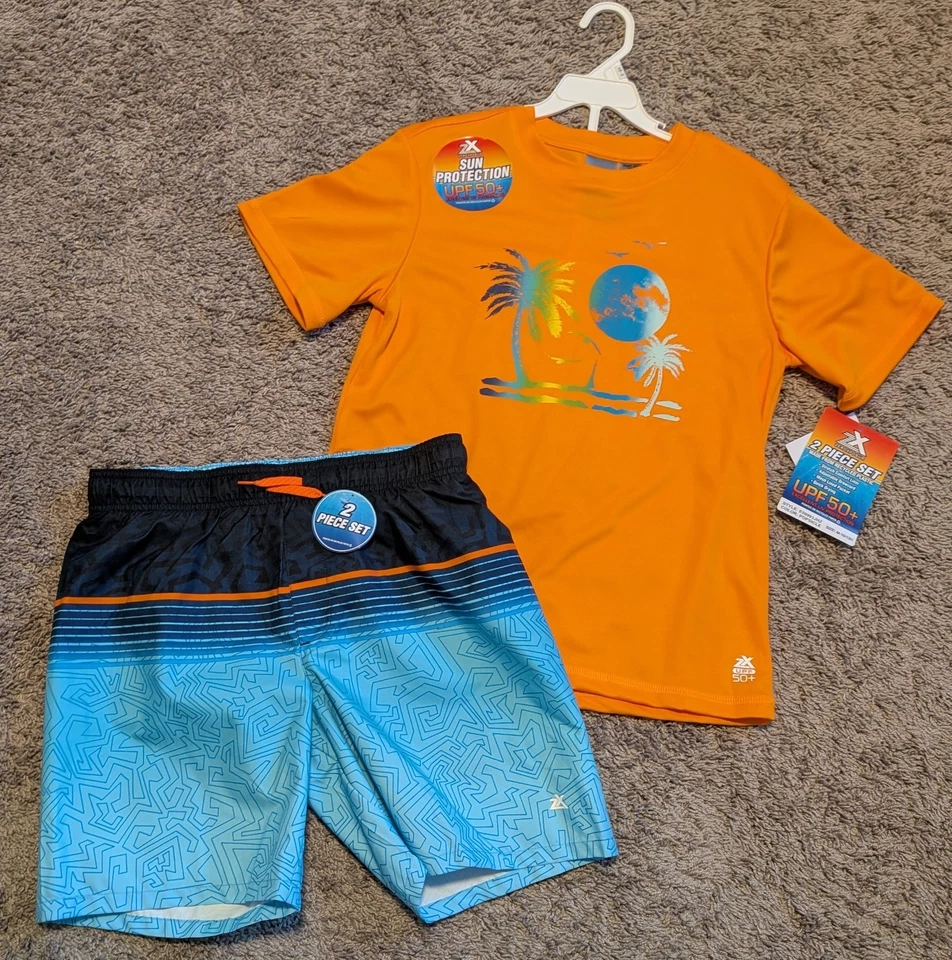 Nuevo con etiquetas Conjunto de camisa de natación pantalones cortos de tabla ZeroXposur 10/12 H para niños venta al por menor: $44 Foto 1 de 1