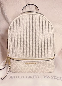 G🧸Michael Kors Rhea Medium Pleated Logo Zip Backpack Packed Tan - Picture 1 of 15