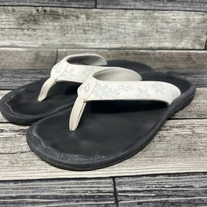 Olukai sandali infradito donna Ohana taglia 7 bianchi fiori orchidea - Foto 1 di 8