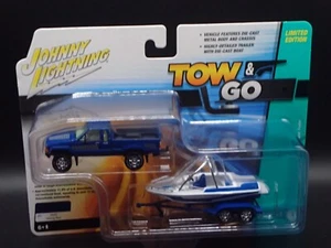 2025 JOHNNY LIGHTNING TOW & GO 1985 TOYOTA SR5 PICKUP WITH BOAT TRAILER REL 2 #1 - Picture 1 of 9