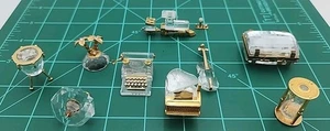 9 Estatuillas de cristal chapadas en oro Swarovski de colección piano violín tren tambor máquina de escribir  - Imagen 1 de 20