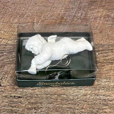 Dept 56 Snowbabies Noel adorno de Navidad bebé con cuerno volando retirado 79880 Foto 1 de 4