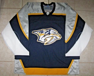 DEPREDADORES Nashville apagados de colección. Jersey Bauer Lic./AUTÉNTICO, talla 56 para hombre - Imagen 1 de 3
