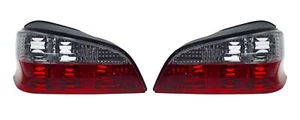 Pair of CRYSTAL RED CLEAR REAR TAIL LIGHTS to fit PEUGEOT 106 96-  - Picture 1 of 3