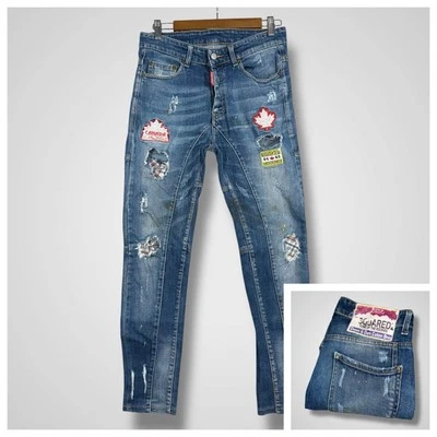 Pantalones de mezclilla desgastados parchados Dsquared2 para hombre 28x28 Dean Dan Caten ajustados cónicos Foto 1 de 4