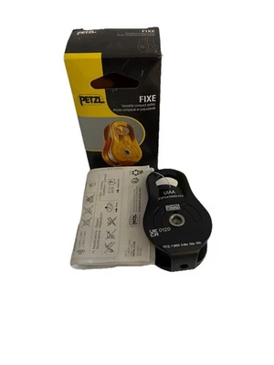 Polea PETZL FIXE negra versátil compacta placas laterales fijas para transporte Foto 1 de 4