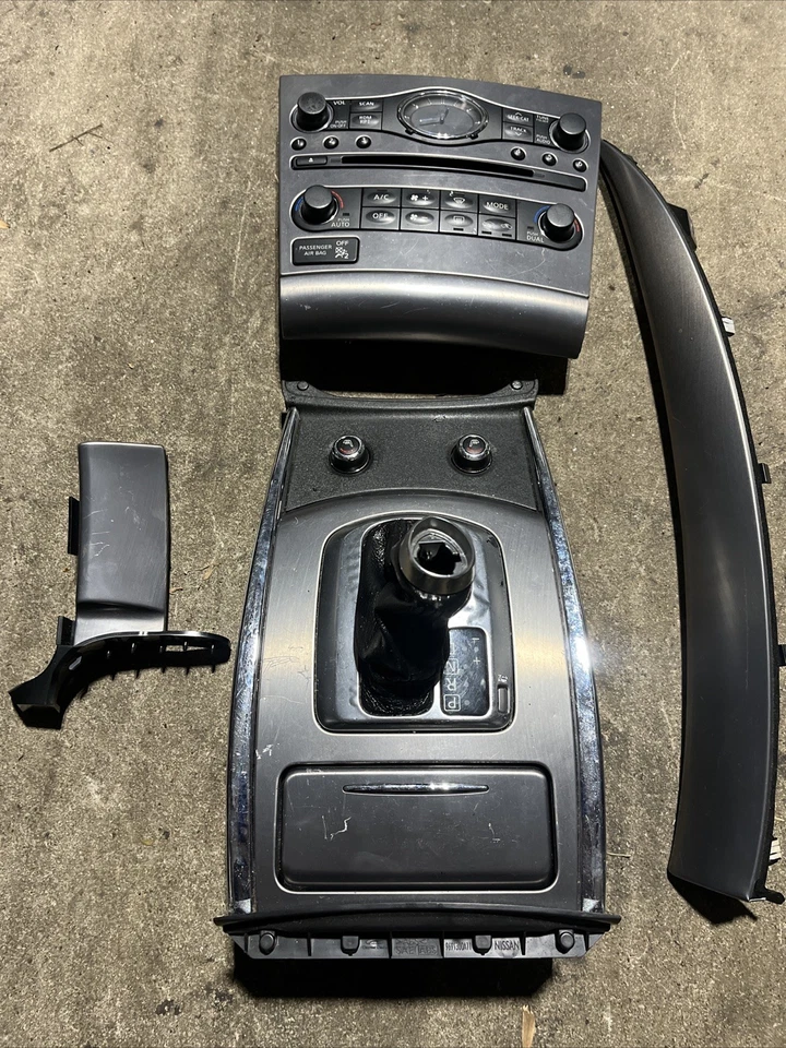 12 13 INFINITI G37 Sedan CENTER CONSOLE GEAR SHIFTER PANEL AUTO TRANS - Image 1 of 4