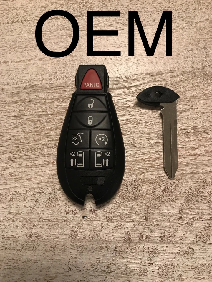 Llavero remoto Dodge Grand Caravan Fobik 7 botones FCC: IYZ-C01C, P/N: 56046709 Foto 1 de 3