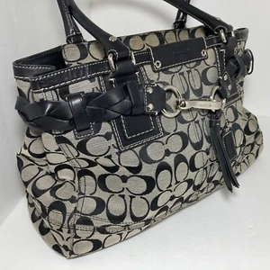 Bolso de mano trenzado con borla COACH HAMPTON Signature F13068 negro tostado - Imagen 1 de 10