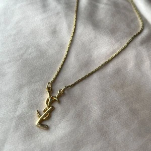 Yves Saint Laurent Halskette Gold YSL Logo Federring Verschluss gebraucht Vintage - Bild 1 von 4