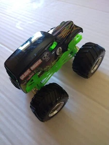 Hot Wheels Monster Jam Grave Digger 4 Time Champion Bad to the Bone Green 1:64 - Picture 1 of 4