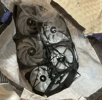 A bagful of Corsair PWM Premium Magnetic Levitation Fans - Black, Mint for build - Image 1 of 4