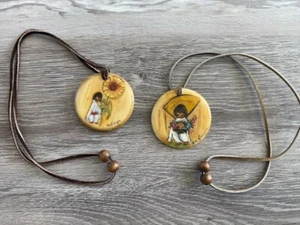 2x VINTAGE DeGrazia NECKLACE Girl With Flowers HAND-PAINTED 2½" PENDANT - Picture 1 of 6