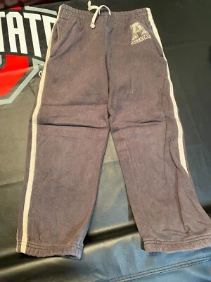 Pantalones deportivos informales con bolsillos talla 5/6 grises Jumping Beans para niños Foto 1 de 3