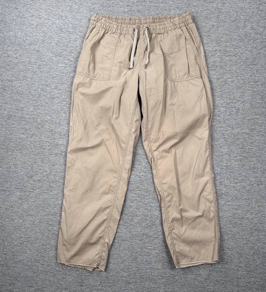 Pantalones Vuori Ripstop para mujer grandes beige dobladillo crudo cintura elástica cordón senderismo Foto 1 de 4