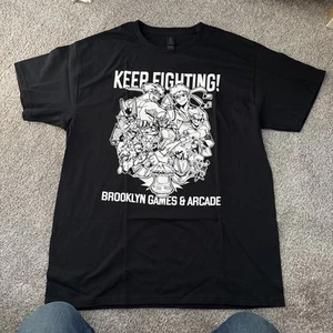 Brooklyn Games & Arcade Fighting Games Graphic T-shirt “Keep Fighting” - Picture 1 of 7