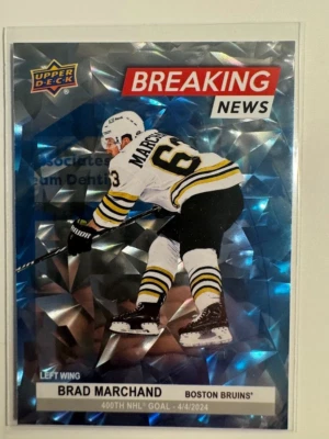 2024-25 Upper Deck Breaking News #BN-5 Brad Marchand Boston Bruins - Image 1 of 2