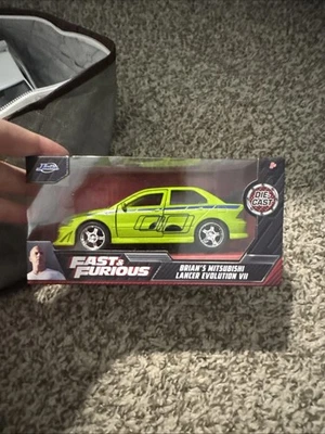 JADA Fast and Furious Brian's Mitsubishi Lancer Evolution литая модель VII масштаб 1:32 - Изображение 1 из 2