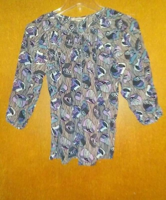 Blusa Tucker talla S se ajusta más como una XS Foto 1 de 3