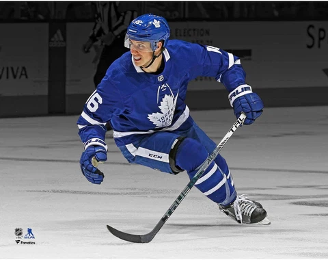 Mitch Marner Toronto Maple Leafs Unsigned Blue Jersey Skating Spotlight Photo Cover