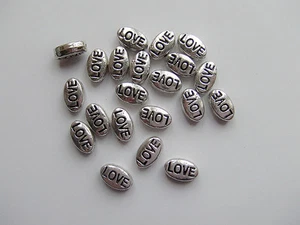 20pz  perline metallo spacer separatori  ovale Love10x6mm colore argento tibet - Foto 1 di 1
