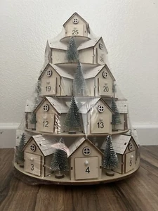 Leuchtender 5-stufiger drehbarer Adventskalender aus Holzdorf - neu versiegelt - Bild 1 von 4