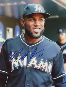 MARCELL OZUNA SMILING MIAMI MARLINS SIGNED 8X10 PHOTO W/COA - Picture 1 of 1