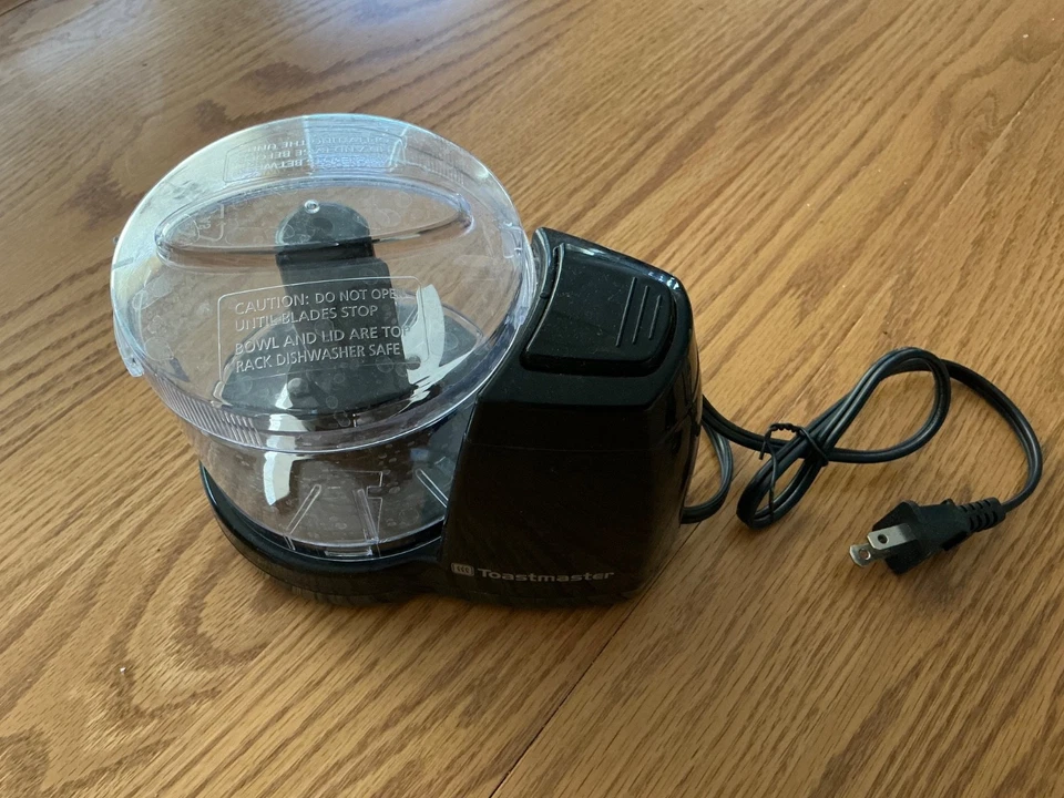 Cortadora cortadora Toastmaster negra y transparente funciona muy bien eléctrica Foto 1 de 2